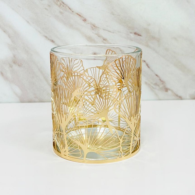 Det elegante hjems forgyldte lysestage af ginkgoglas er lanceret og oplyser en ny verden af ​​boligæstetik.